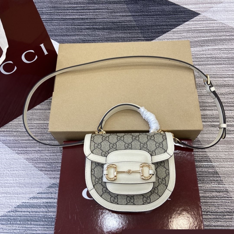 G*u*i top handle bags